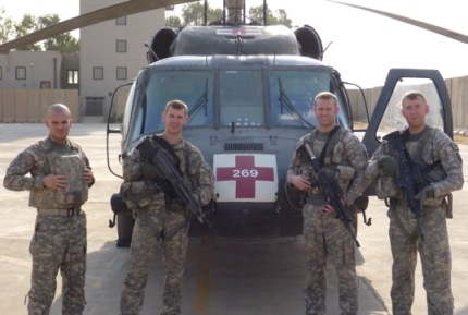 Sergeant Nathan Nebelsick (2nd from left), w/ his crew